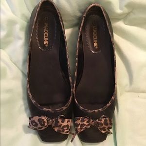Madeline Black flats with leopard trim and bow.
